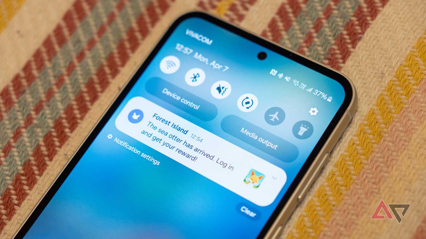 a closeup of a phone displaying a push notification for a game