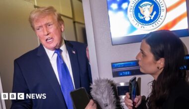 USS Abraham Lincoln in the Arabian Sea and satellite image of the aircraft carrier