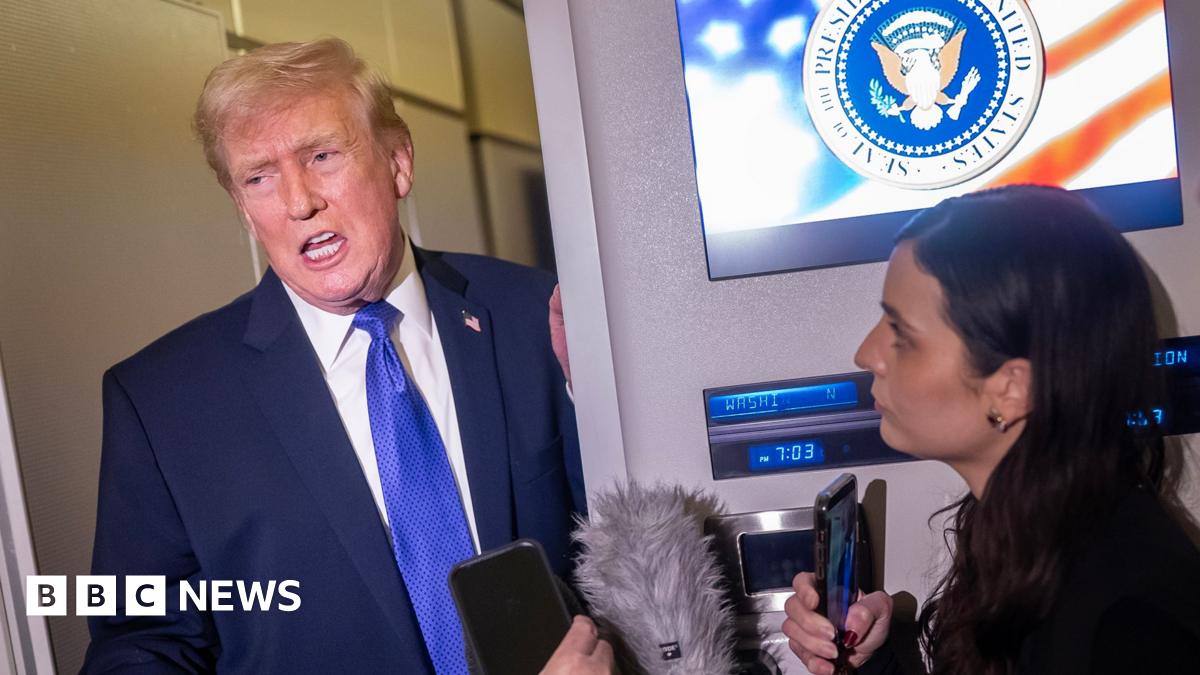 USS Abraham Lincoln in the Arabian Sea and satellite image of the aircraft carrier