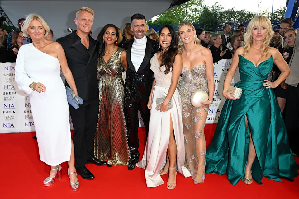 Alice Beer, Dr Scott Miller, Sonia Sodha, Dan Hatfield, Dr Sara Kayat, Ashley James and Clodagh McKenna pose together on the red carpet at the 2024 NTAs.