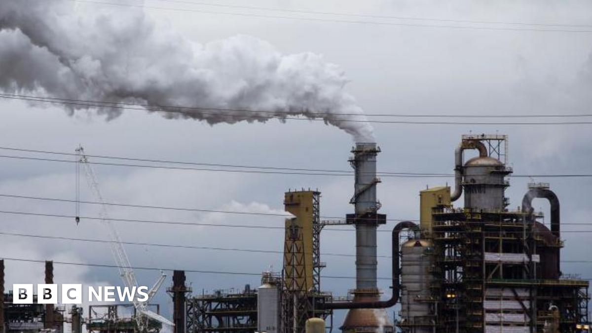 Steam rises from the Syncrude Canada Ltd facility in the Athabasca oil sands near Fort McMurray, Alberta, Canada (file picture)