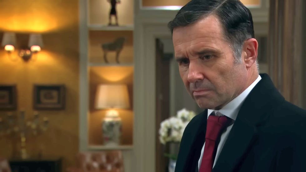 emmerdale, graham foster looking concerned inside the tate house