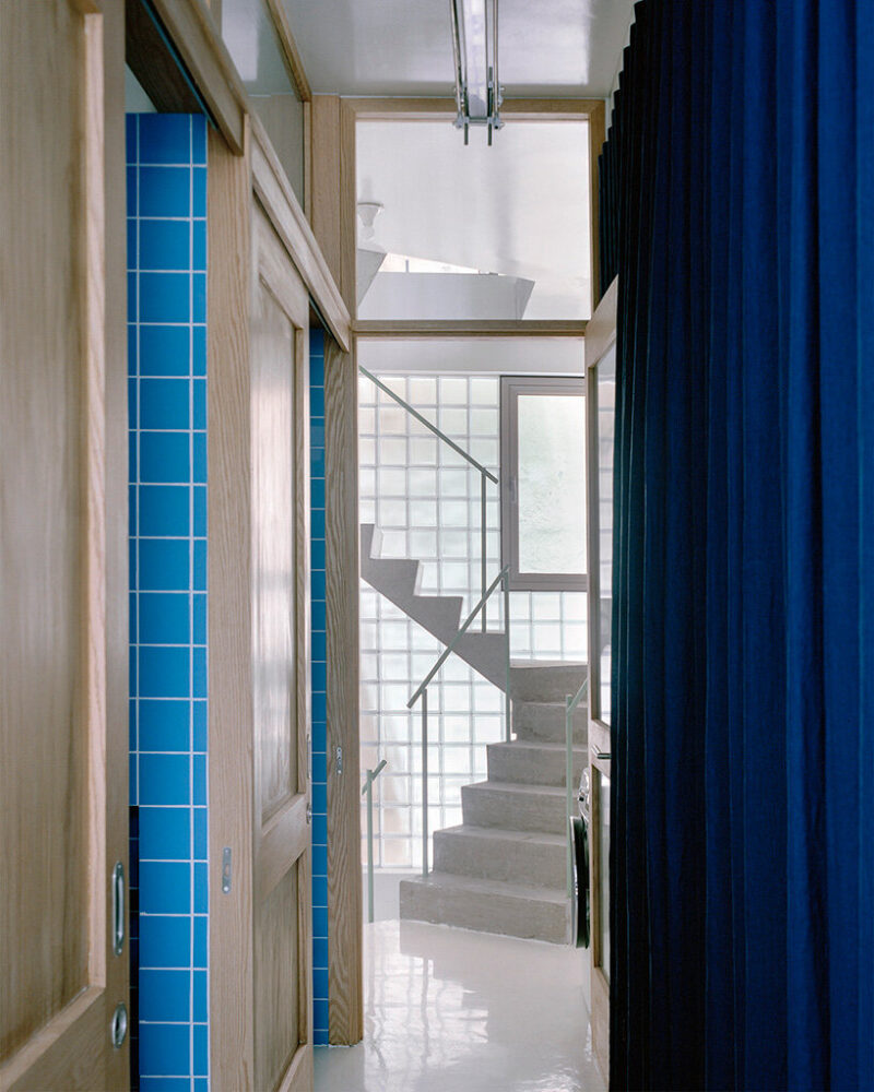 tube houses are defined by their narrow plots and deep plans, often resulting in dim and stuffy interiors