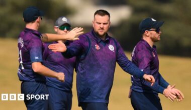 Mark Watt celebrates taking a wicket against Afghanistan in a T20 World Cup warm-up match