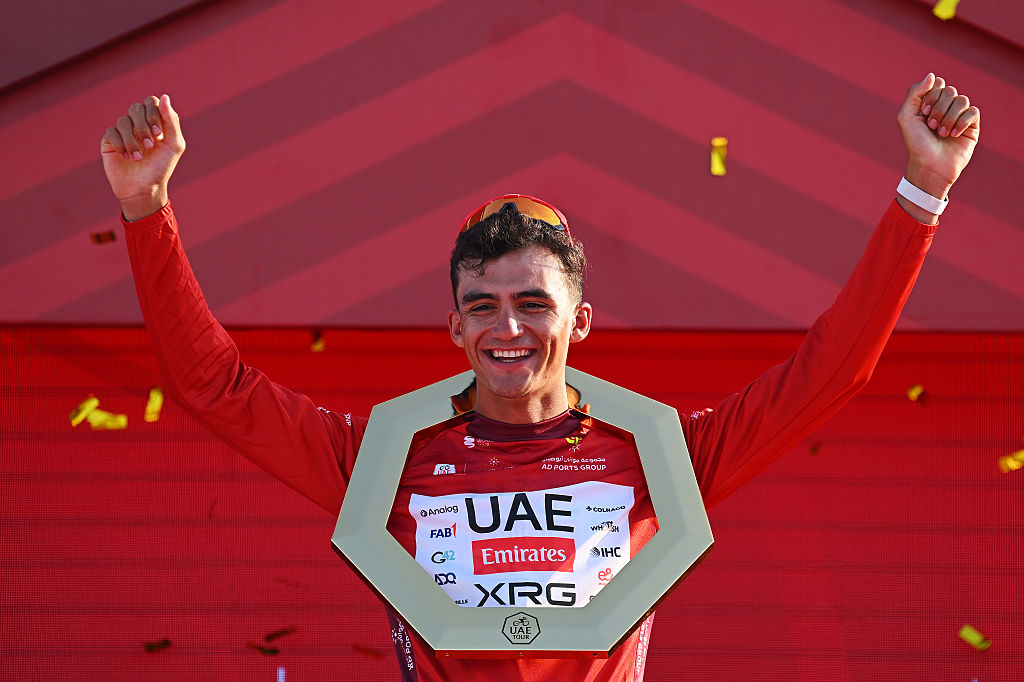 ABU DHABI, UNITED ARAB EMIRATES - FEBRUARY 22: Isaac Del Toro of Mexico and UAE Team Emirates - XRG celebrates at podium as Red Leader Jersey winner during the 8th UAE Tour 2026, Stage 7 a 149km stage from Zayed National Museum to Abu Dhabi Breakwater / #UCIWT / on February 22, 2026 in Abu Dhabi, United Arab Emirates. (Photo by Tim de Waele/Getty Images)