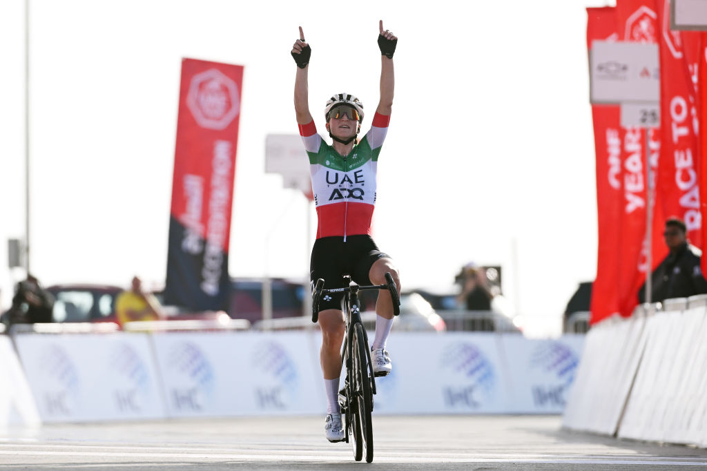 JEBEL HAFEET, UNITED ARAB EMIRATES - FEBRUARY 08: Elisa Longo Borghini of Italy and UAE Team ADQ celebrates at finish line as stage winner during the 3rd UAE Tour Women, Stage 3 a 152km stage from Al Ain Qasr Al Muwaiji to Jebel Hafeet 1031m / #UCIWWT / on February 08, 2025 in Jebel Hafeet, United Arab Emirates. (Photo by Tim de Waele/Getty Images)