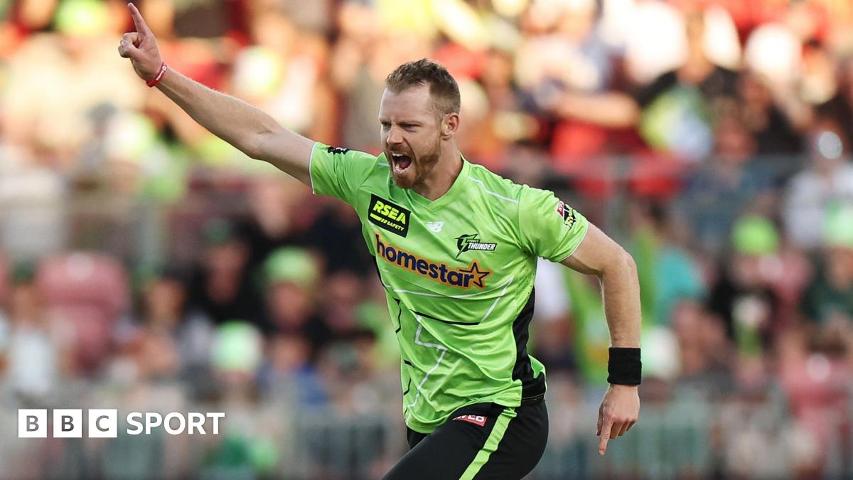 Nathan McAndrew celebrates taking a wicket for Sydney Thunder