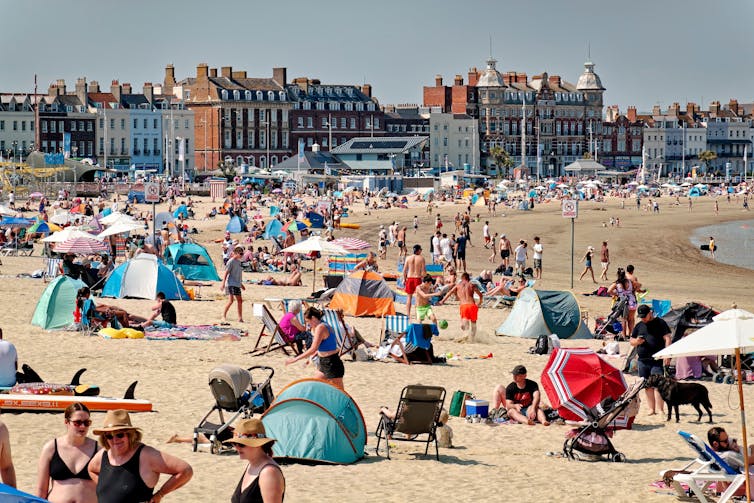 packed Weymouth Beach on a hot day