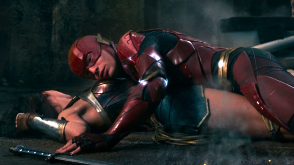 The Flash falling on Wonder Woman in Justice League (2017)