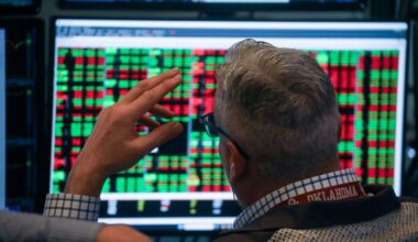 Dow tumbles more than 800 points as tariff uncertainty and AI disruption fears roil markets