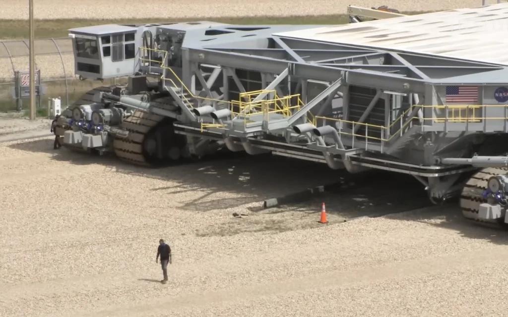 Before liftoff, NASA relies on its giant crawler-transporters to haul rocket ships on a journey that is slower than most people walk.