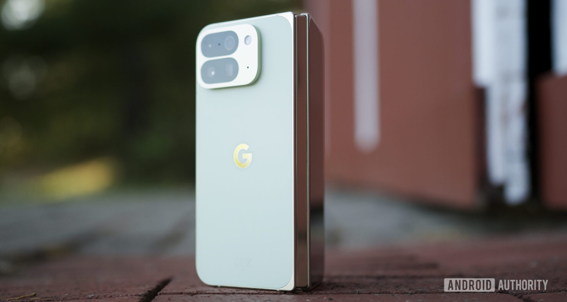 The Google Pixel 10 Pro Fold standing upright outside.