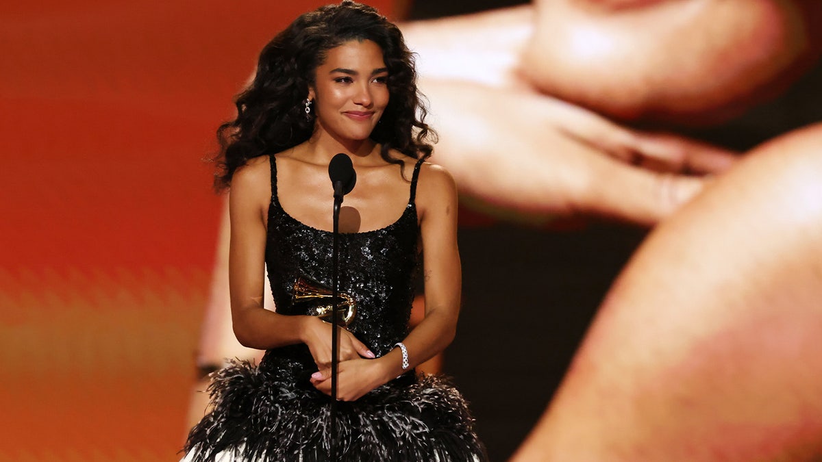 Olivia Dean accepts Best New Artist Grammy award