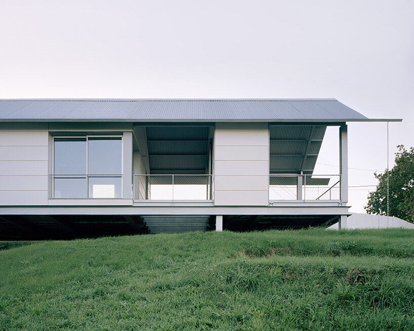HANGHAR assembles steel-framed prefab residence in 48 hours on sloped spanish plot