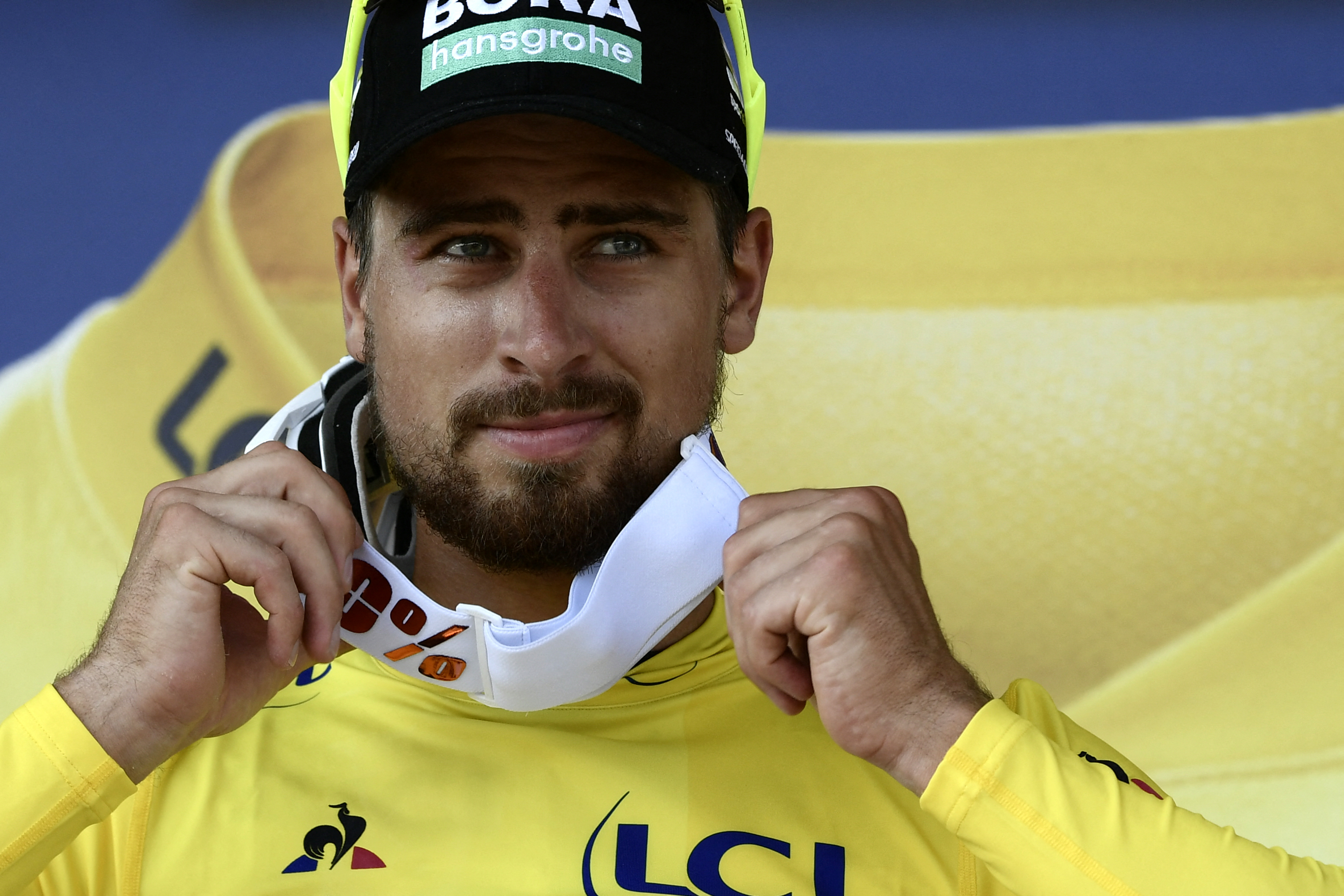 Slovakia&amp;apos;s Peter Sagan, wearing the overall leader&amp;apos;s yellow jersey, reacts on the podium after winning the second stage of the 105th edition of the Tour de France cycling race between Mouilleron-Saint-Germain and La Roche-sur-Yon, western France, on July 8, 2018. (Photo by Philippe LOPEZ / AFP) (Photo by PHILIPPE LOPEZ/AFP via Getty Images)