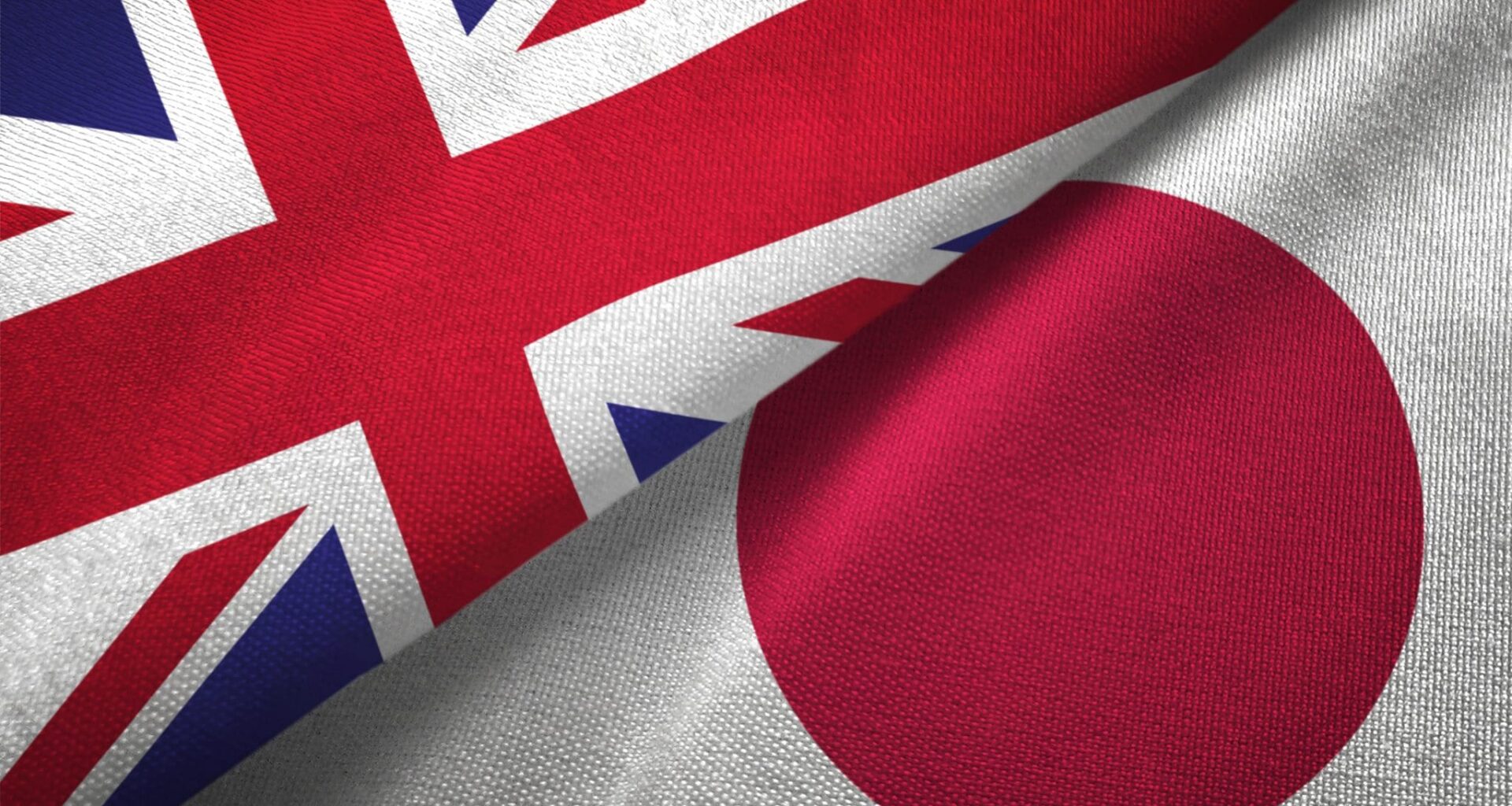 Japan and United Kingdom two flags together realations textile cloth fabric texture