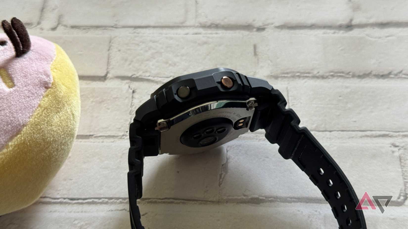 G-Shock Move DWH5600 recessed buttons laying on its side