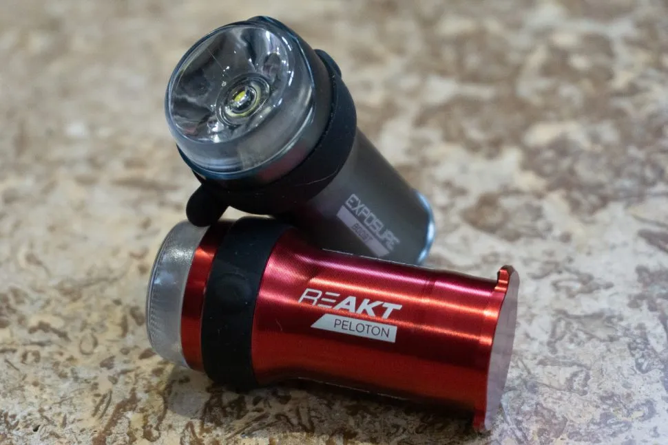 Silver and red bicycle lights