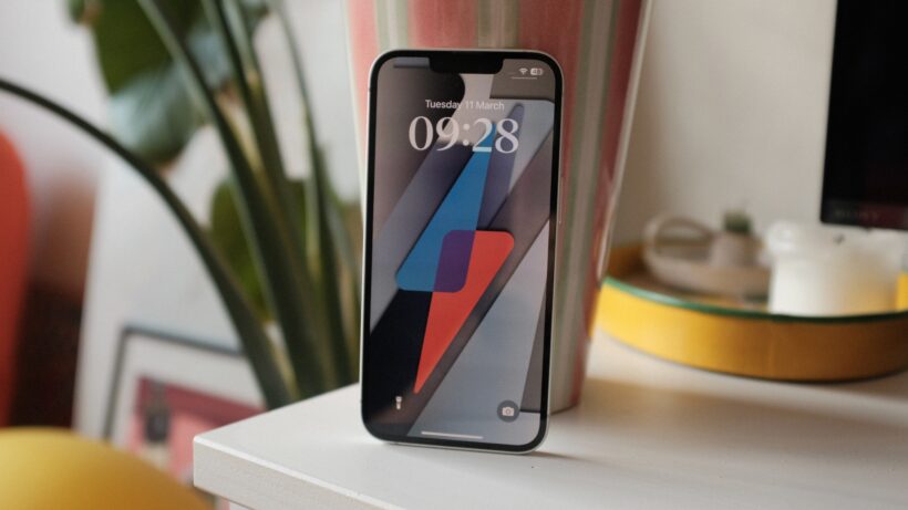 iphone 16e front with TR wallpaper