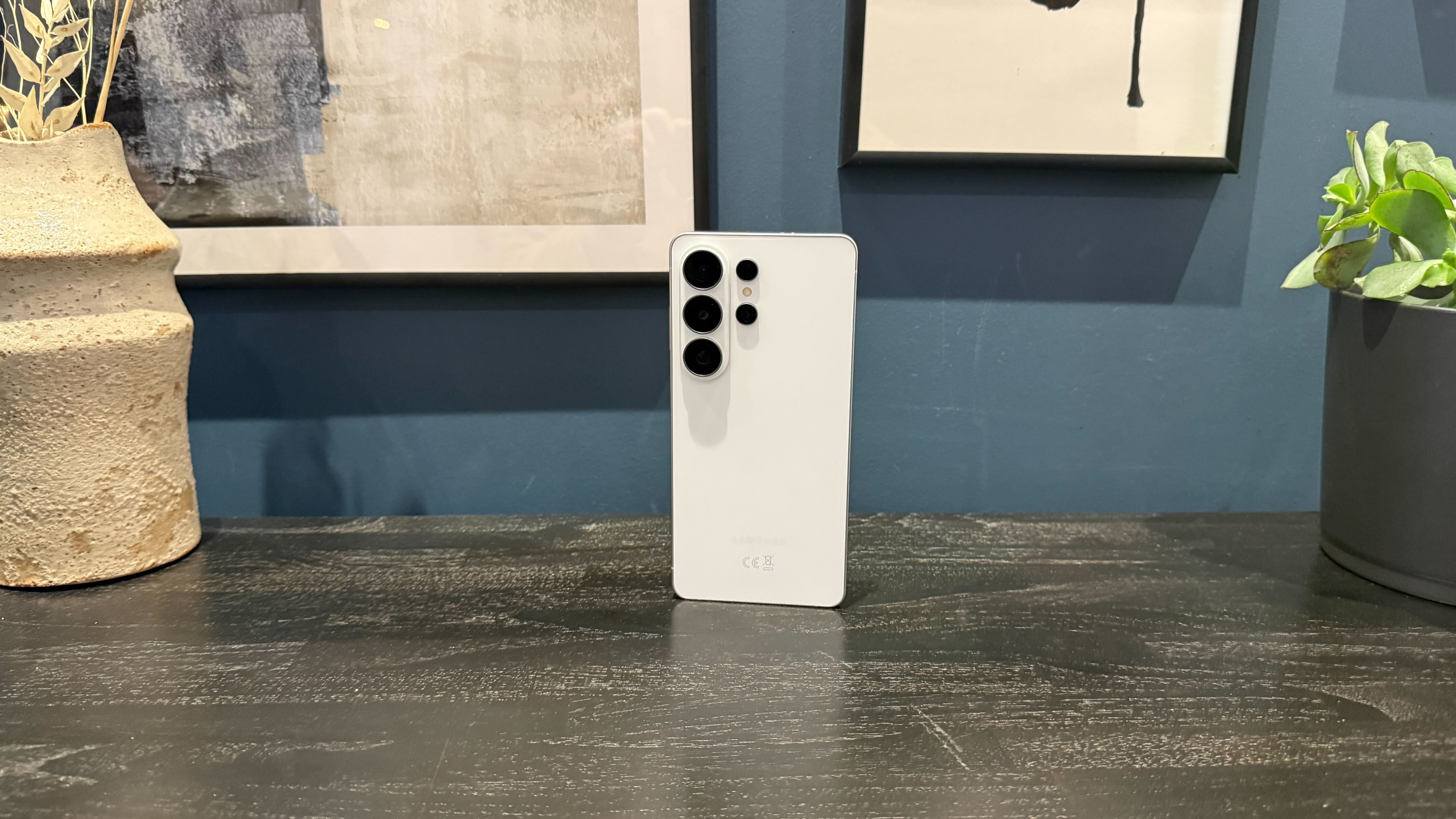 A Samsung Galaxy S26 Ultra smartphone in a modern home environment