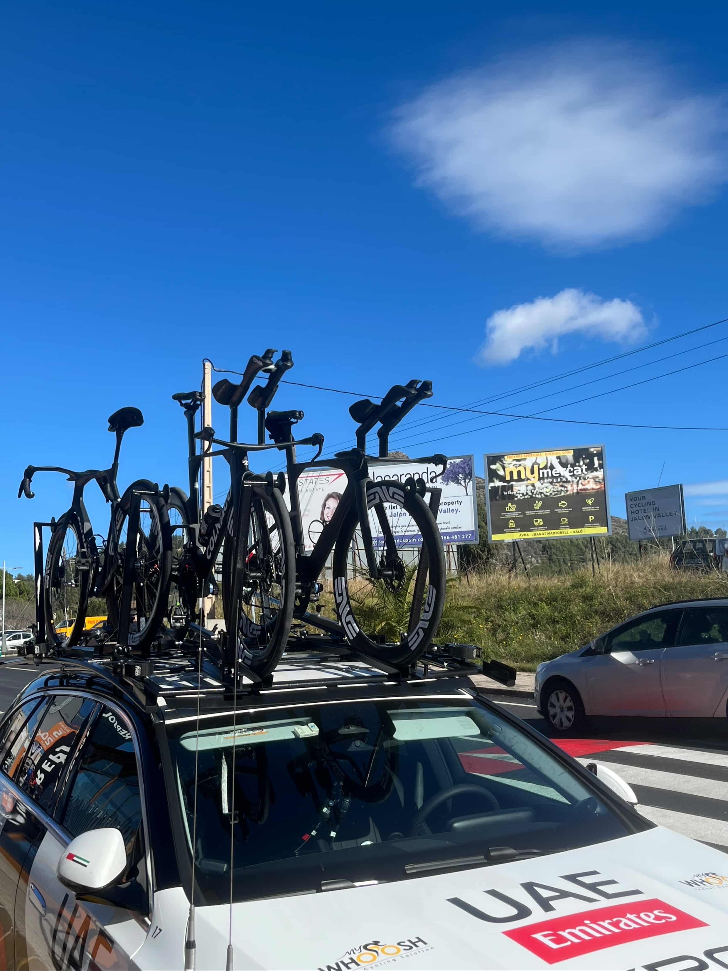 A Colnago time trial bike on a UAE team car