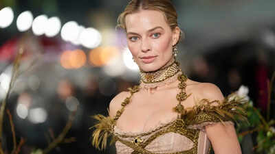 Margot Robbie wears bracelet with Bronte sisters' hair to 'Wuthering Heights' London premiere - PICS