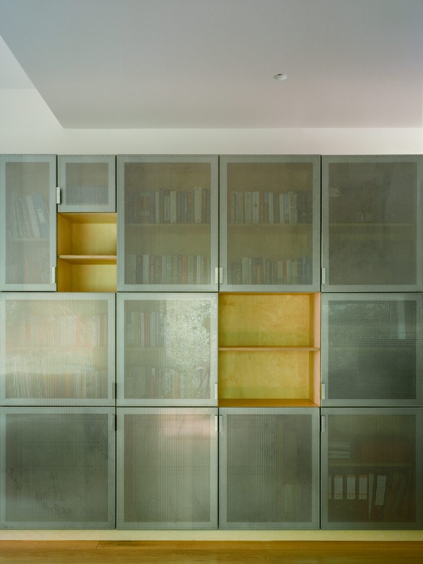 Perforated steel front of home extension by Neiheiser Argyros