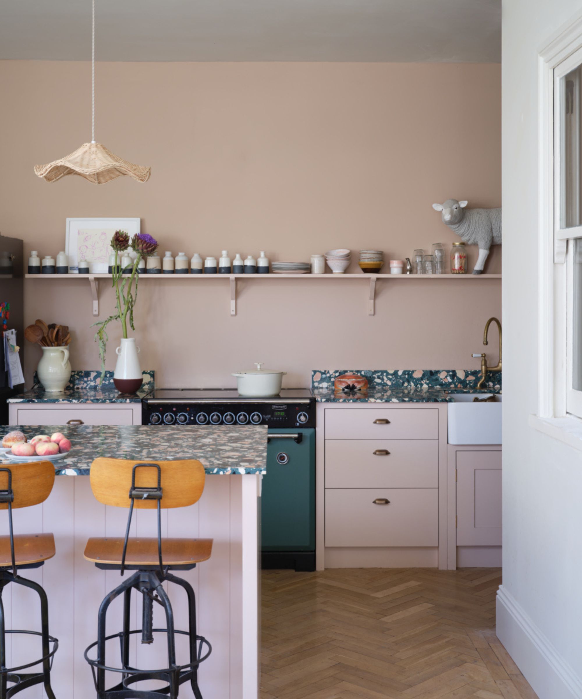 Kitchen walls in Setting Plaster and cabinets in Templeton Pink, both from Farrow &amp; Ball