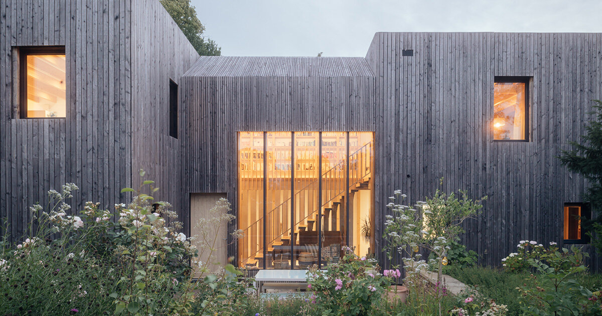 studio bark shapes 'orchard house' as two silvery larch-clad cubes