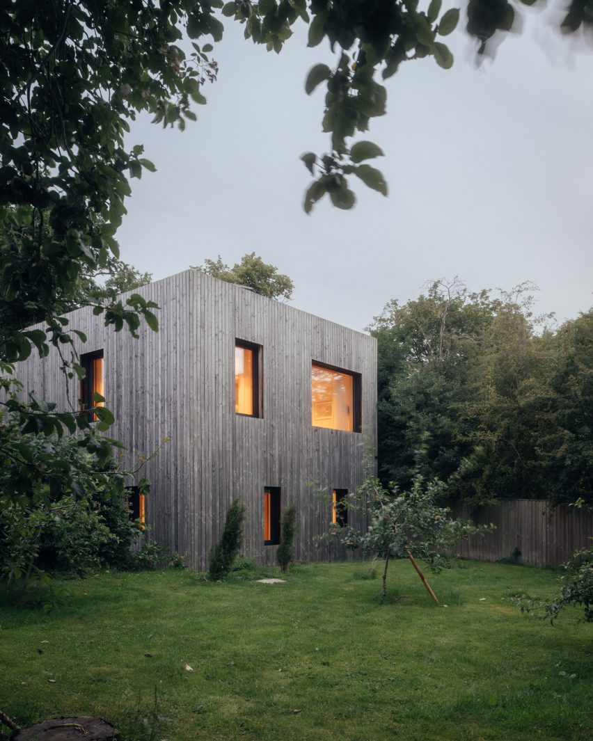 Larch-clad exterior of Orchard House designed by Studio Bark