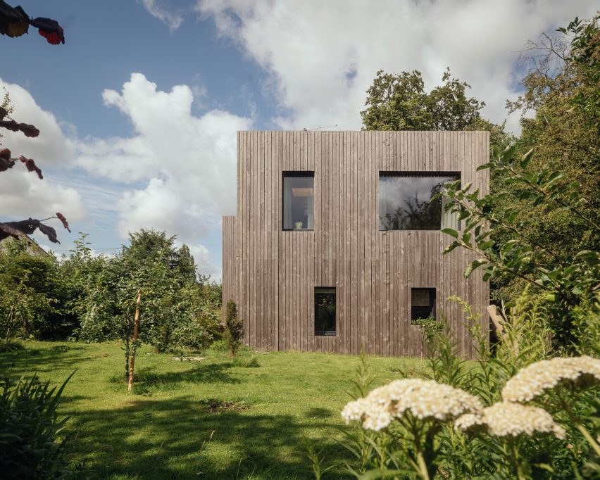 Larch-clad exterior of Orchard House designed by Studio Bark