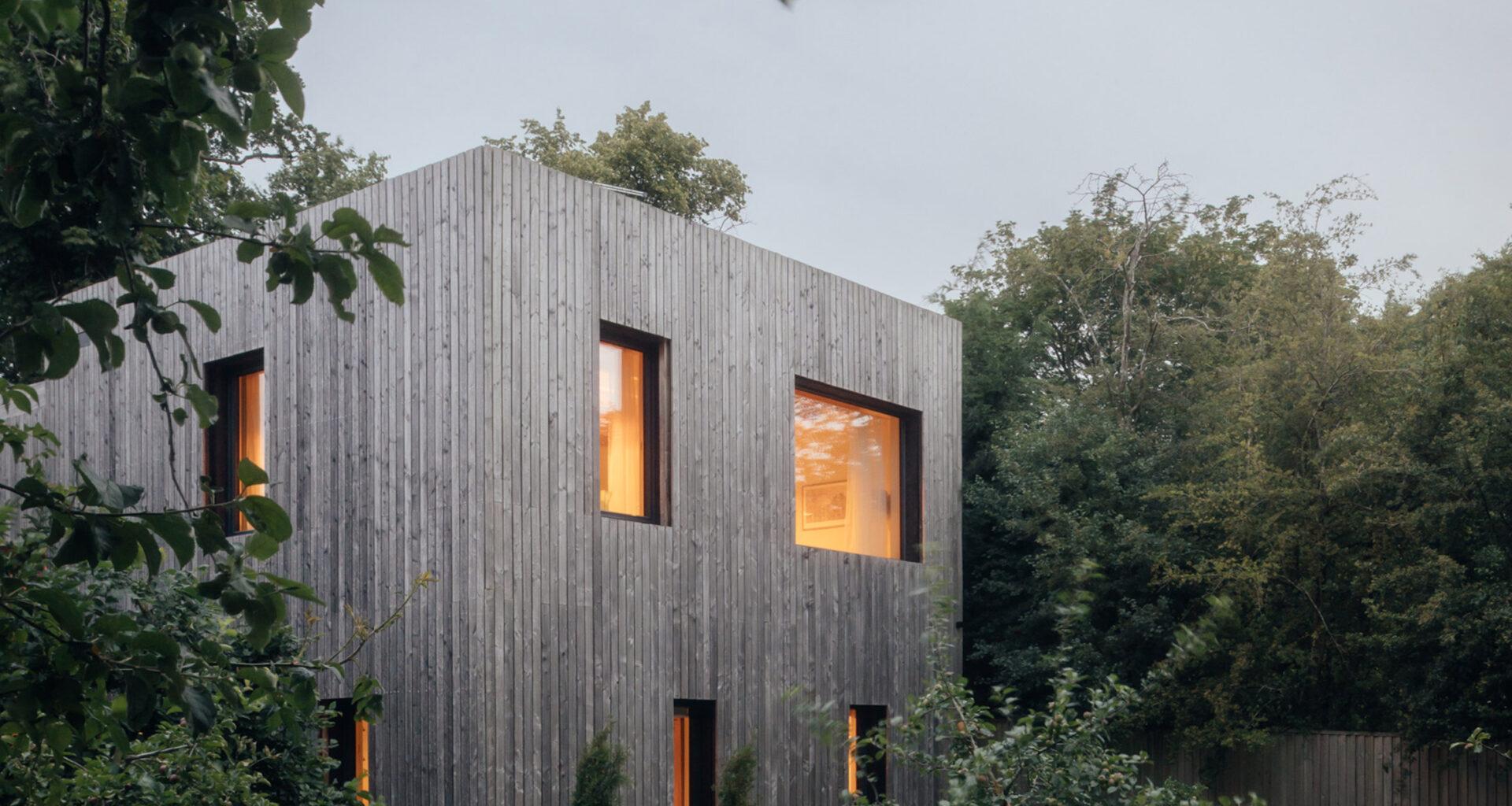 Studio Bark unveils larch-clad Orchard House in Cheshire
