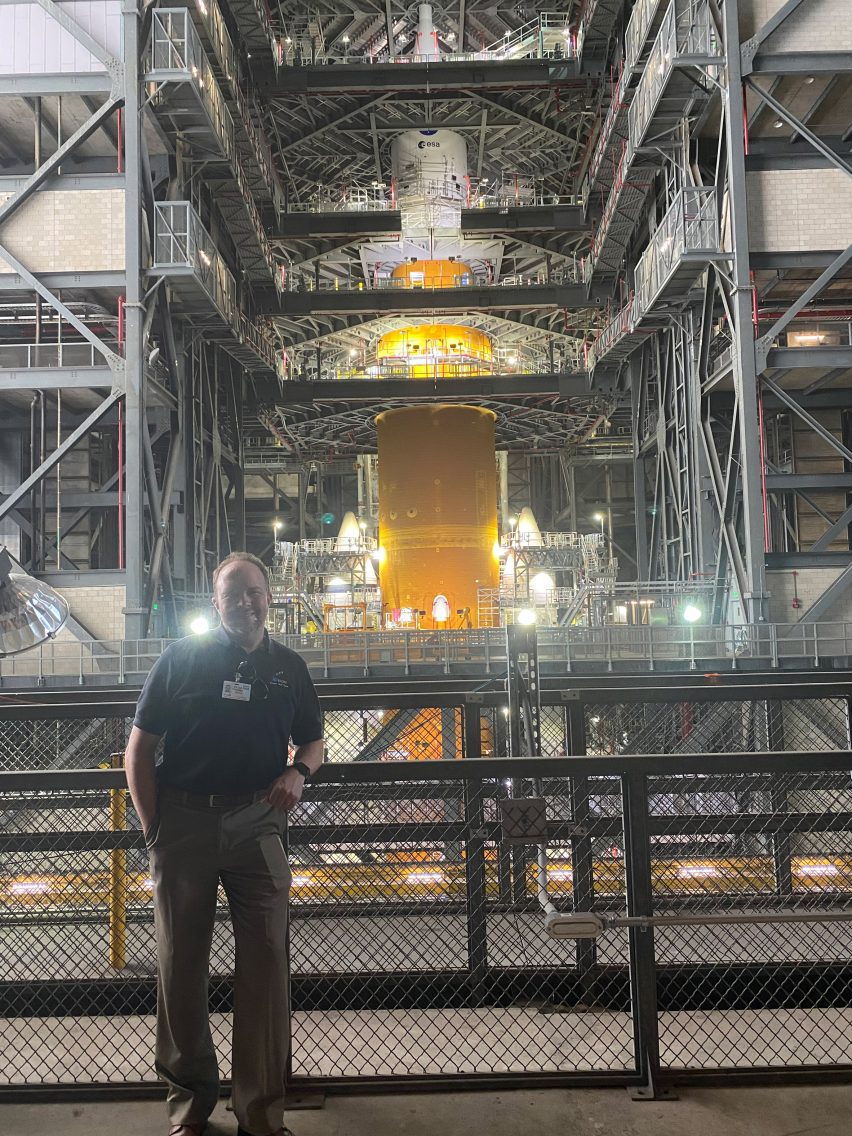 Sean ODell in front of Artemis II rocket