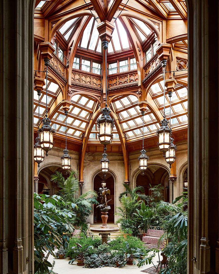 The stunning Biltmore House is the largest privately owned mansion in the US – pictured, the winter garden (Credit: William Abranozicz)