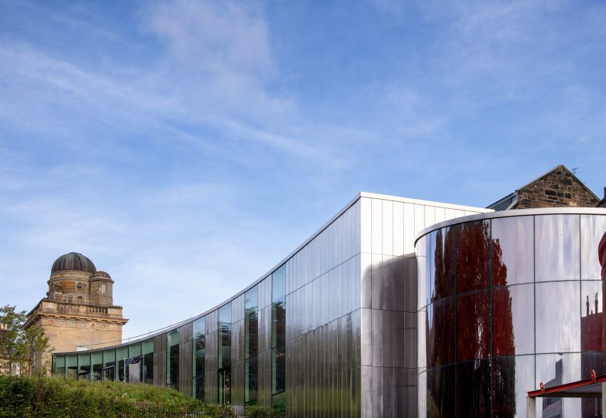 Steel-clad museum with glass entrance