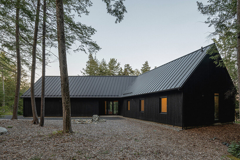 paul bernier architecte fragments residence on quebec's lake brompton into three wings