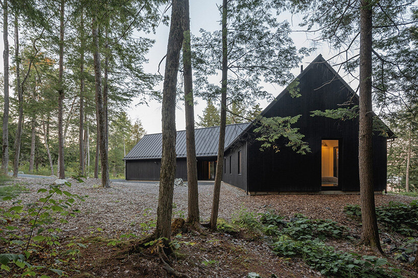 paul bernier architecte fragments residence on quebec's lake brompton into three wings