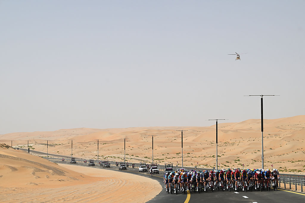 ABU DHABI, UNITED ARAB EMIRATES - FEBRUARY 16: A general view of the peloton competing during the 8th UAE Tour 2026, Stage 1 a 144km stage from Madinat Zayed Majlis to Liwa Palace on February 16, 2026 in Abu Dhabi, United Arab Emirates. (Photo by Tim de Waele/Getty Images)