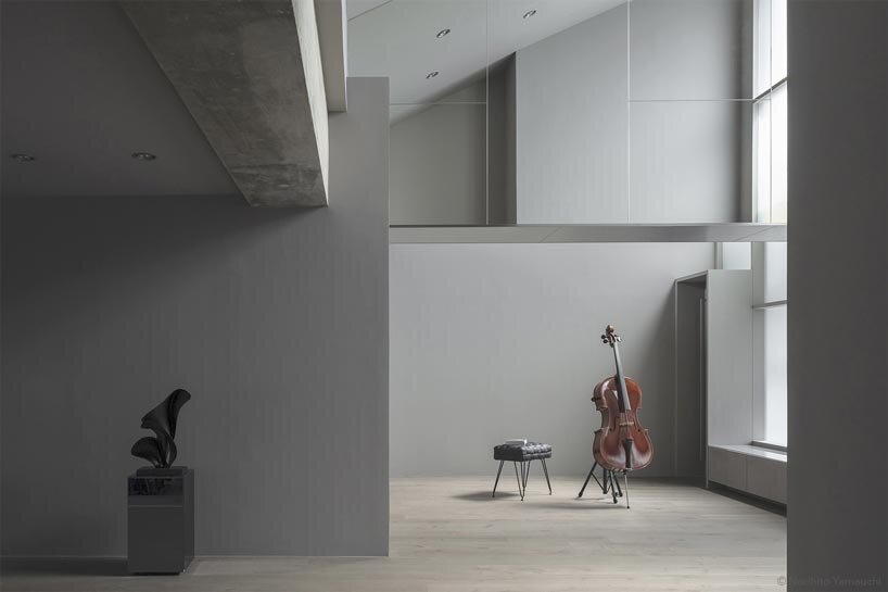 geometric frosted glass screens filter daylight within renovated room 1101 osaka apartment