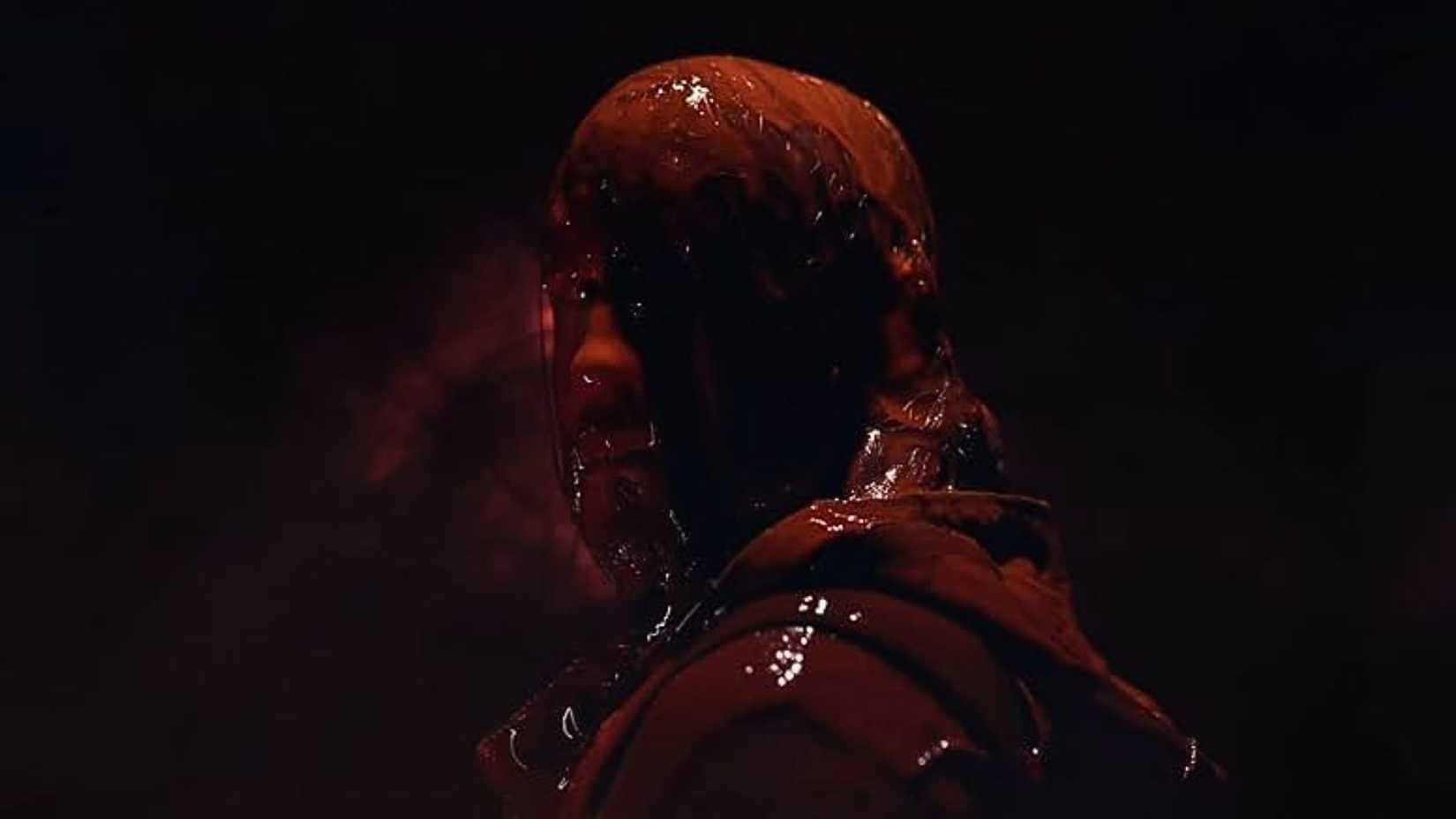 Mark Fischbach covered in blood in Iron Lung