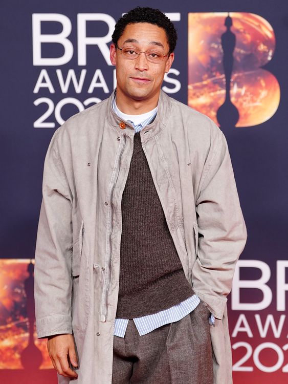 Loyle Carner looking casual and comfy - not words often associated with red carpet looks. Pic: PA