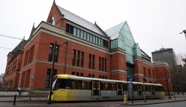 The men appeared at Manchester Minshull Street Crown Court. Pic: PA