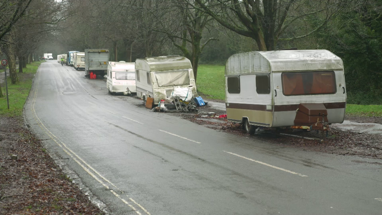 Vans line a road in Bristol