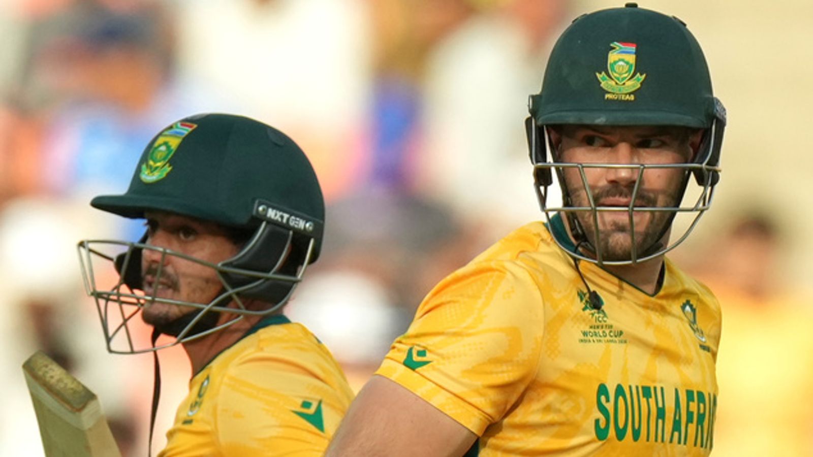 South Africa's captain Aiden Markram, right, and batting partner Quinton de Kock run between the wickets during the T20 World Cup cricket match between South Africa and West Indies in Ahmedabad, India, Thursday, Feb. 26, 2026. (AP Photo/Ajit Solanki)