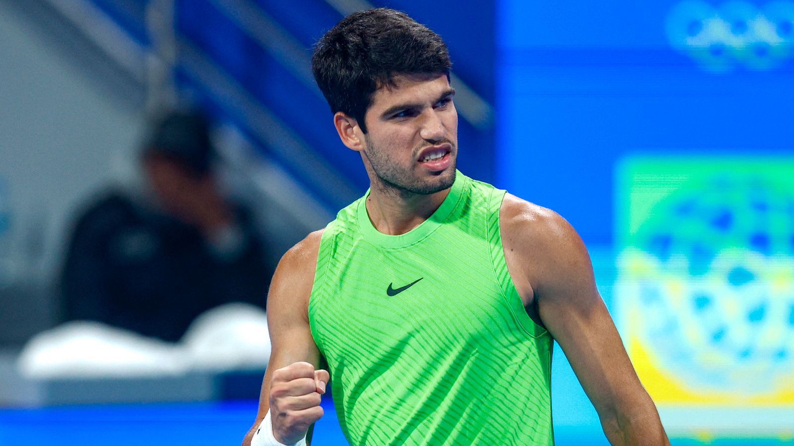Spain's Carlos Alcaraz reacts after a point against France's Valentin Royer during their men...s singles match at the Qatar Open tennis tournament in Doha on February 18, 2026. (Photo by Karim JAAFAR / AFP)