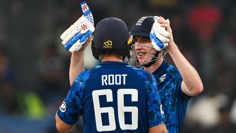 England's captain Harry Brook celebrates after scoring a century (100 runs) with Joe Root during the third one-day international (ODI) cricket match between Sri Lanka and England at the R. Premadasa International Cricket Stadium in Colombo on January 27, 2026. (Photo by Ishara S. KODIKARA / AFP)