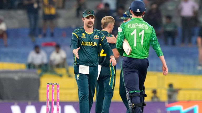 Australia's captain Travis Head, left, walks to shake hands with Ireland's Matthew Humphreys