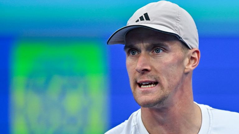Jan Choinski of Great Britain competes against Jakub Mensik of the Czech Republic during the Round of 32 at the ATP men's Qatar ExxonMobil O