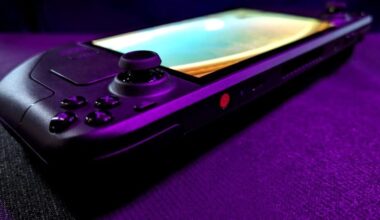 A Steam Deck OLED sits on a table.