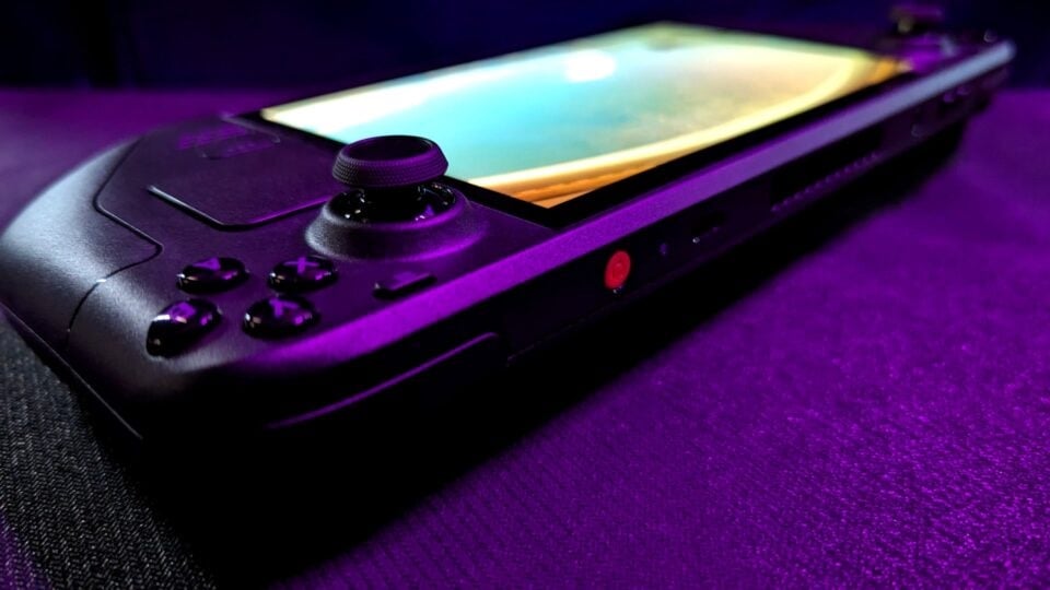 A Steam Deck OLED sits on a table.